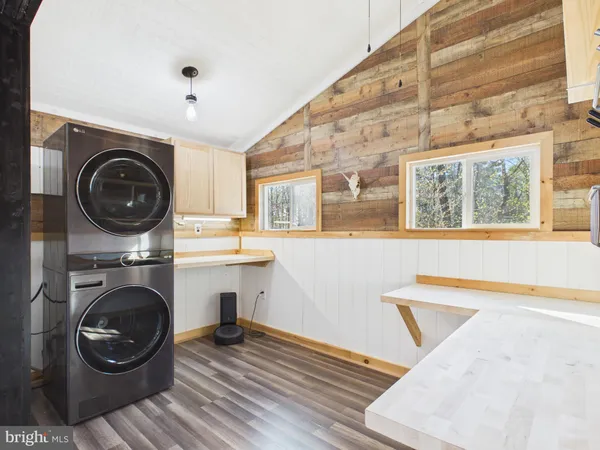 a view of kitchen with furniture and window