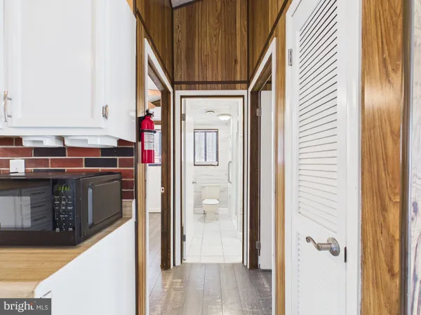 a bathroom with a toilet sink and shower