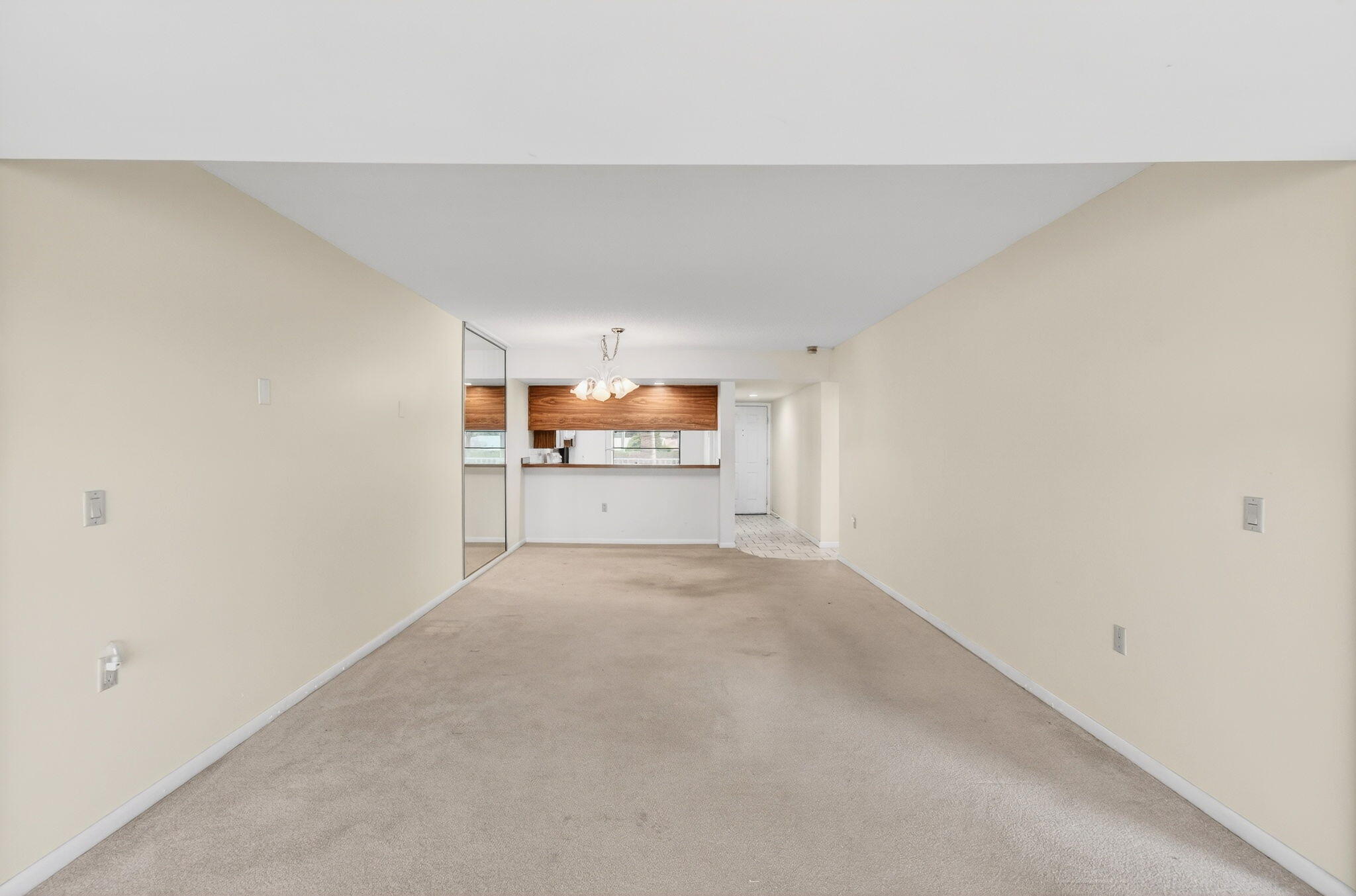 6049 Balboa Circle, Unit 205 Boca Raton, FL 33433 - Photo 12 of 27 a view of a refrigerator and window