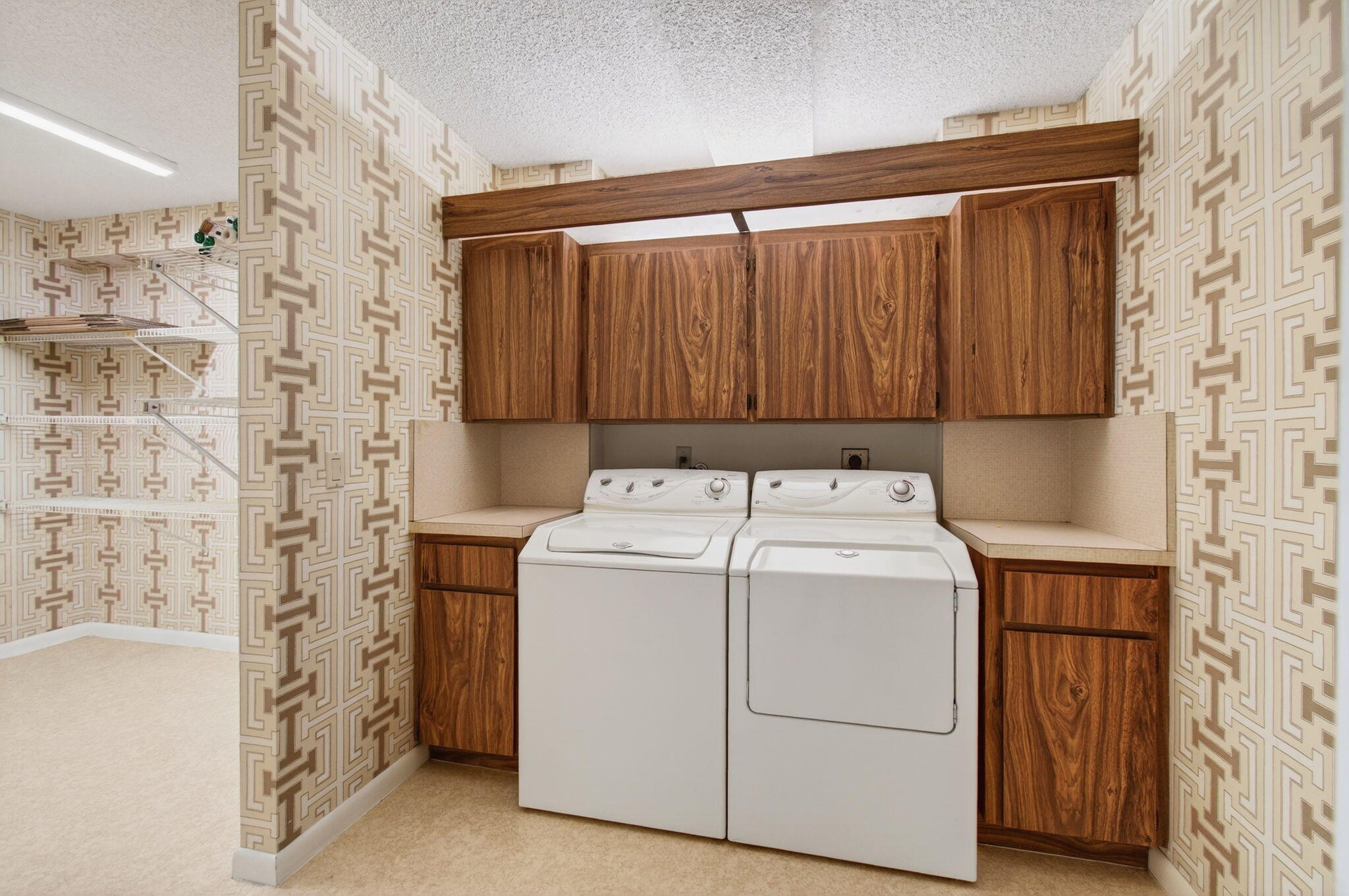 6049 Balboa Circle, Unit 205 Boca Raton, FL 33433 - Photo 21 of 27 a utility room with dryer and washer