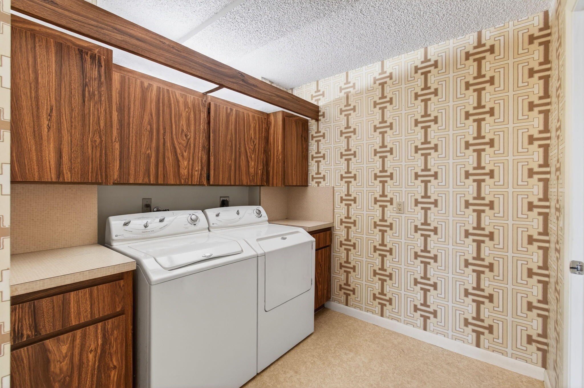 6049 Balboa Circle, Unit 205 Boca Raton, FL 33433 - Photo 22 of 27 a utility room with dryer and washer