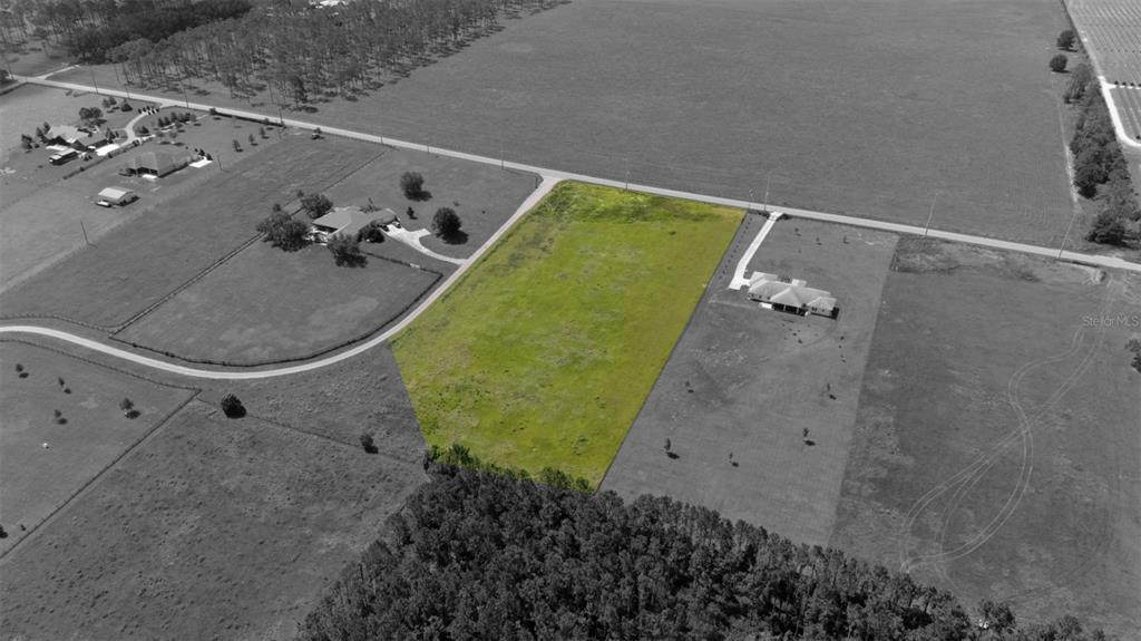 36365 Frazee Hill Road Dade City, FL 33523 - Photo 11 of 15 a bathroom with a sink and mirror