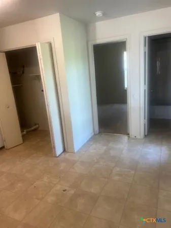 an empty room with closet