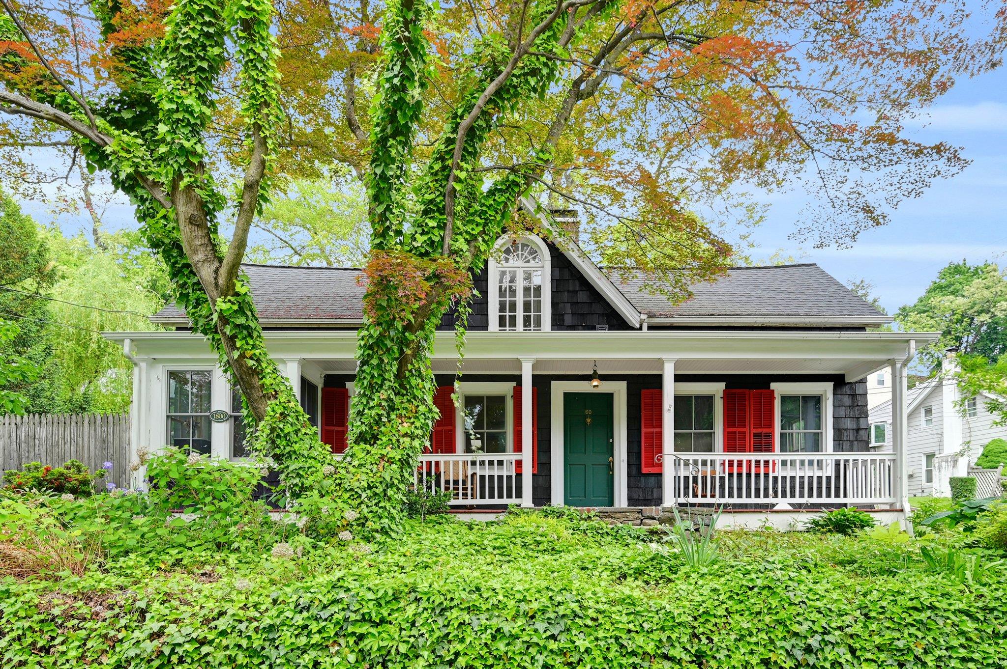 60 Revolutionary Road Ossining, NY 10562 - Photo 1 of 1 View of front of home featuring roof with shingles, a porch, and fence