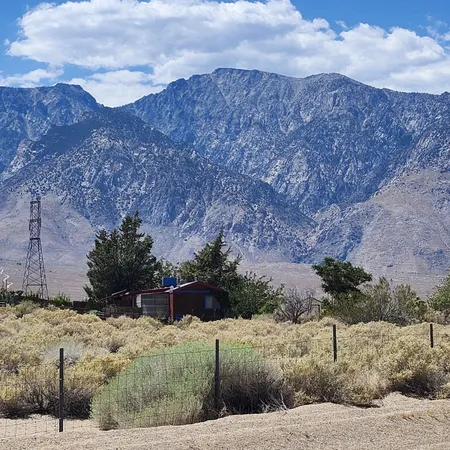 a view of a backyard of a house
