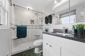 283 Brookwood Road Venetia, PA 15367 - Photo 15 of 36 a bathroom with a sink a toilet and shower