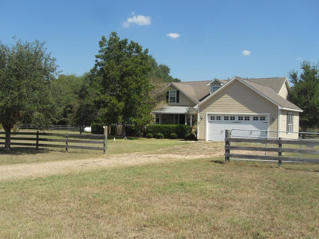 8456 Schuster Road Ledbetter, TX 78946 - Photo 7 of 49 a view of house with a yard