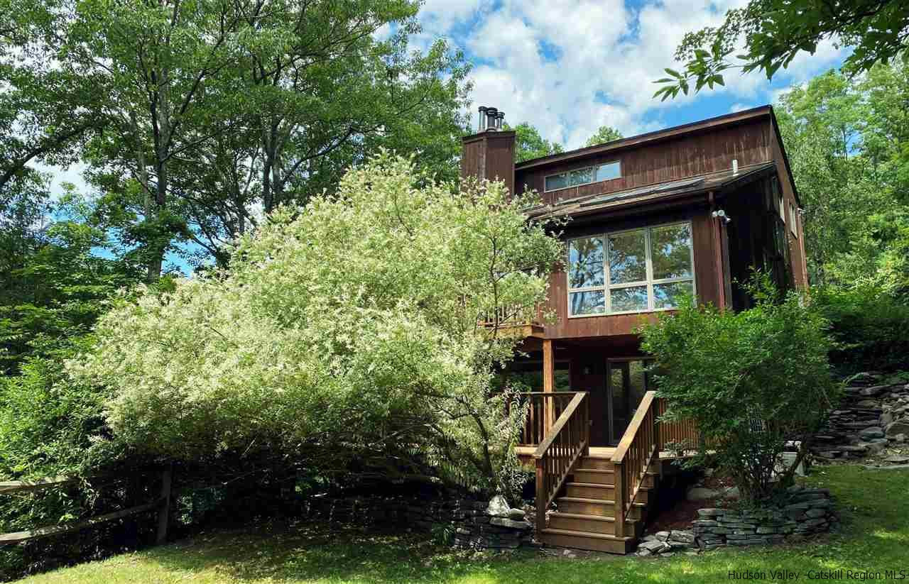 41 Mountain Road Mount Tremper, NY 12457 - Photo 2 of 33 a house view with a garden space