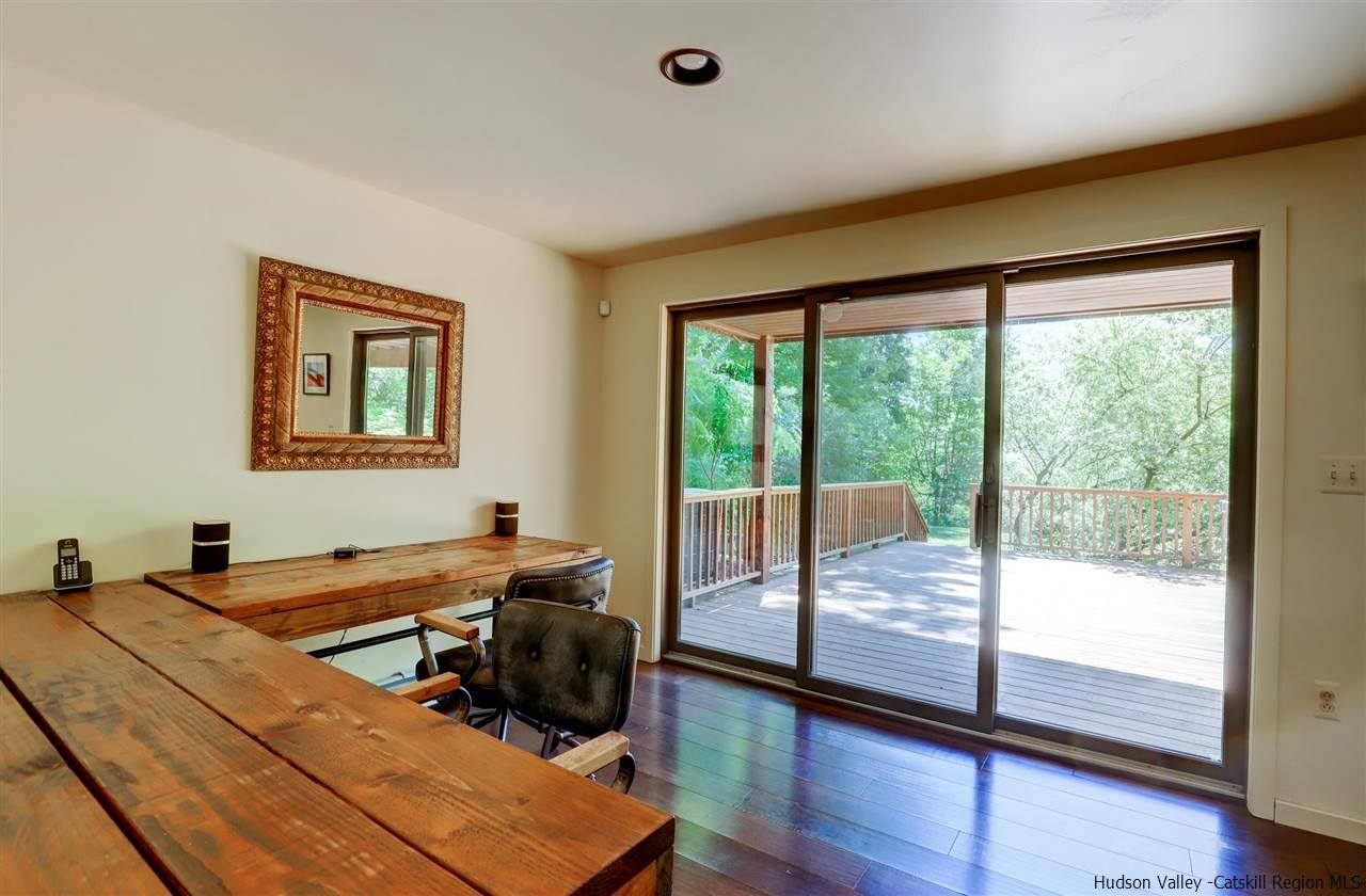 41 Mountain Road Mount Tremper, NY 12457 - Photo 22 of 33 a bed room with a bed and a window