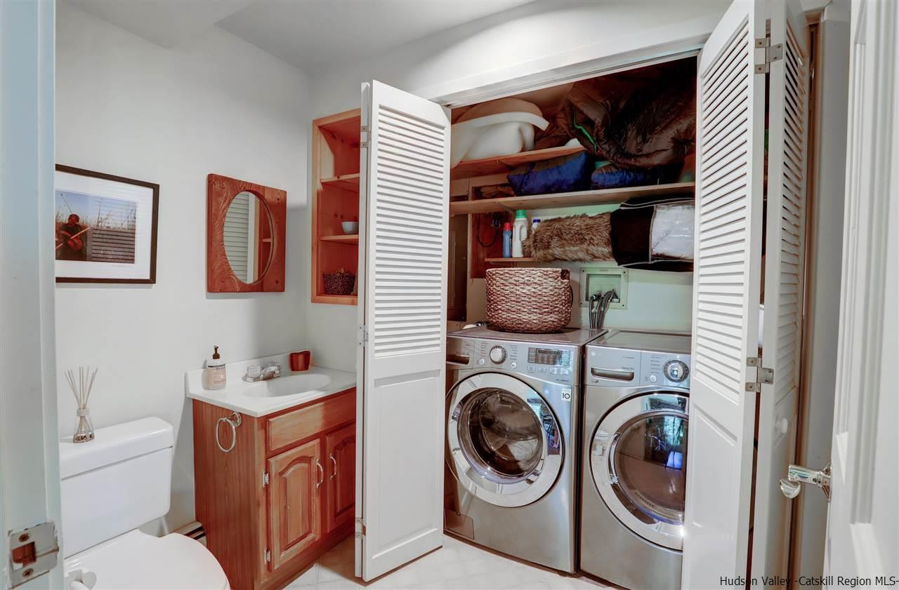 41 Mountain Road Mount Tremper, NY 12457 - Photo 25 of 33 a view of a hallway with washer and dryer