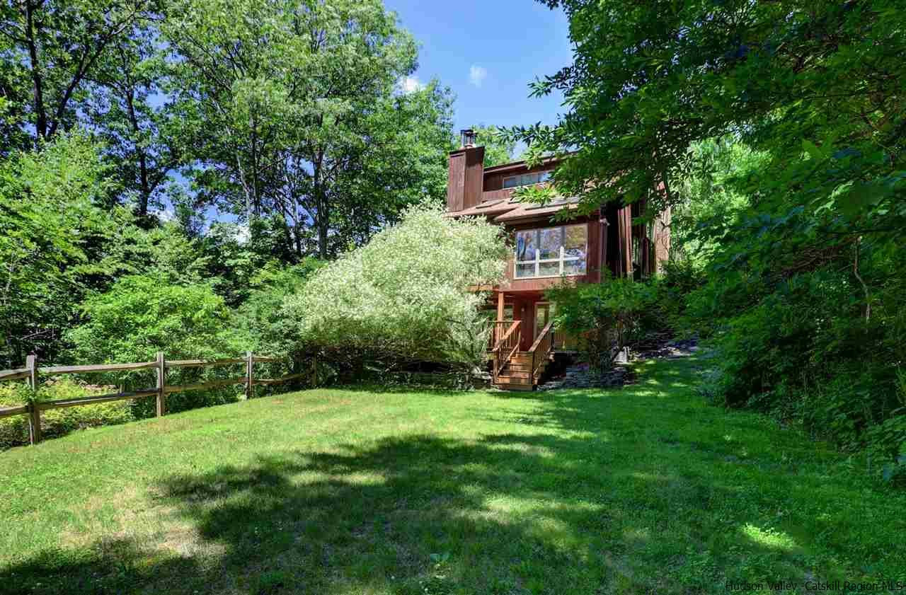 41 Mountain Road Mount Tremper, NY 12457 - Photo 29 of 33 a view of green field with plants and trees