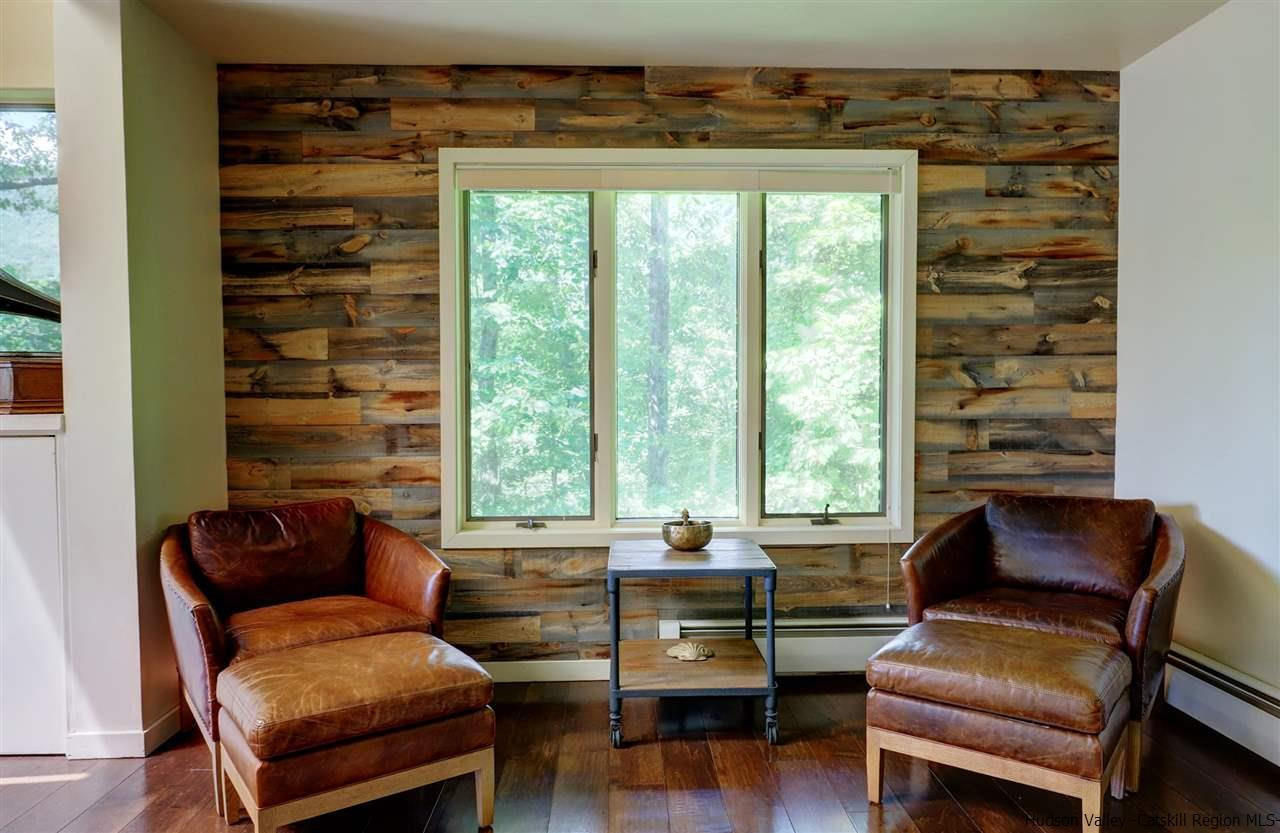 41 Mountain Road Mount Tremper, NY 12457 - Photo 10 of 33 a living room with furniture and a window