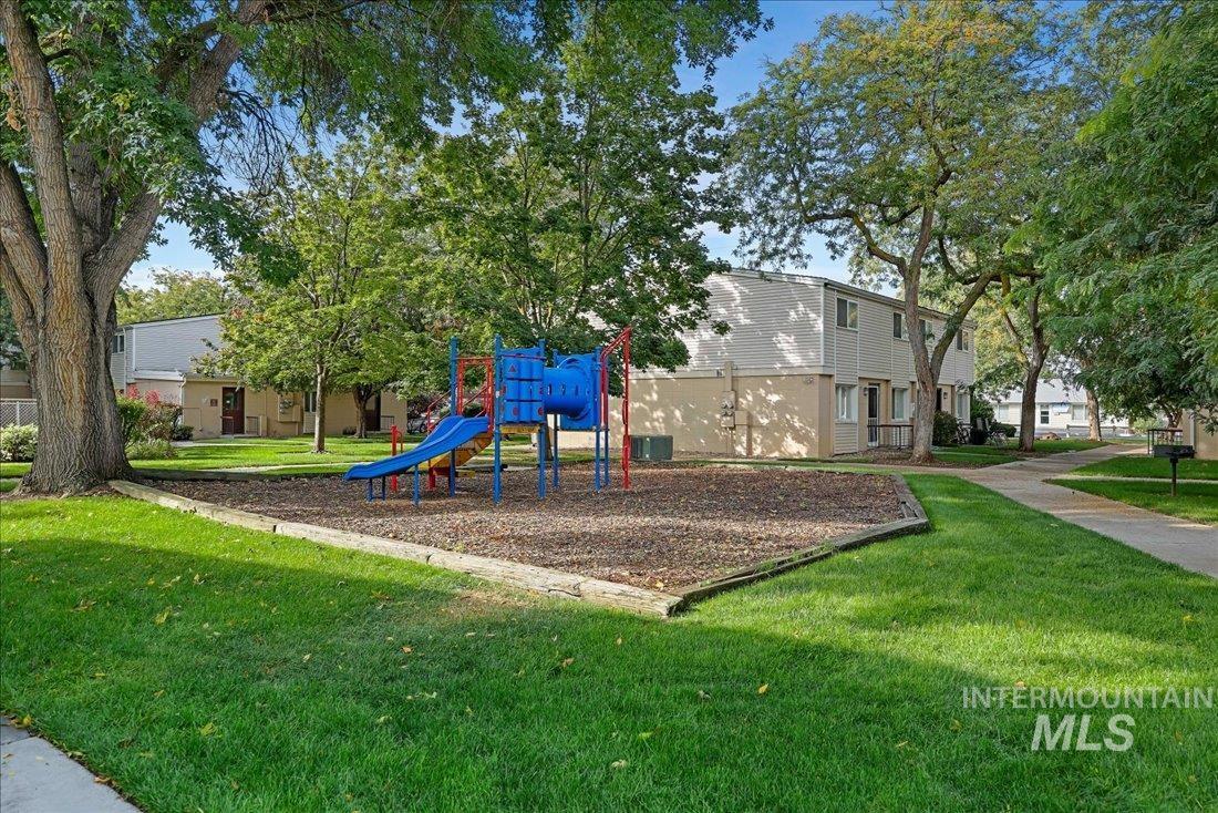 824 South Curtis Road Boise, ID 83705 - Photo 3 of 19 Communal playground featuring a yard