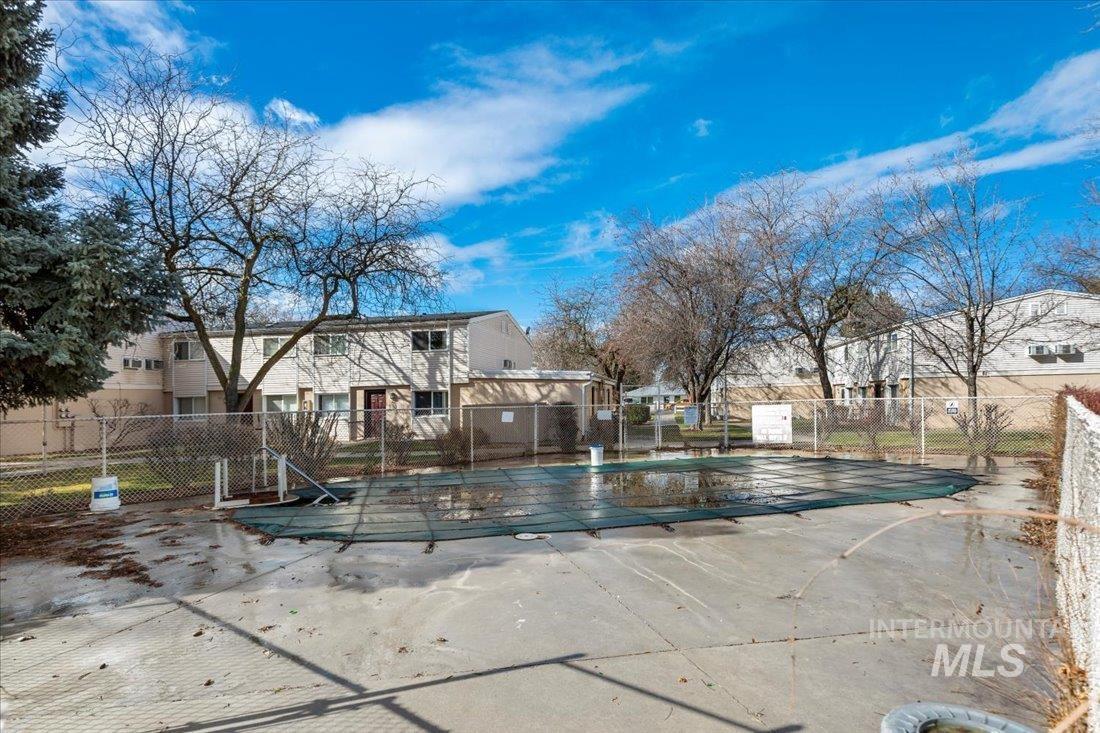 824 South Curtis Road Boise, ID 83705 - Photo 5 of 19 Community pool featuring a patio area