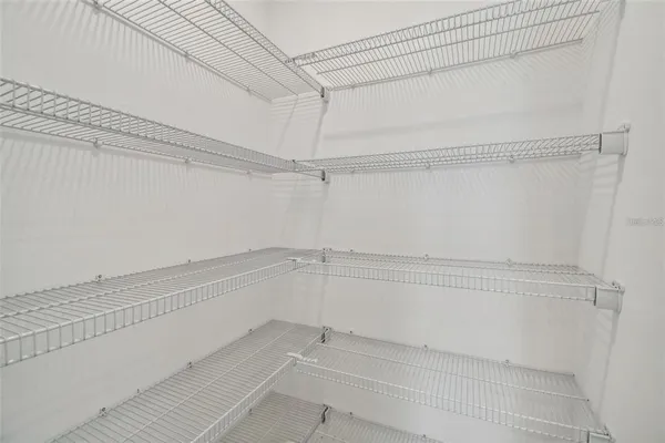 a view of a room with racks on the wall