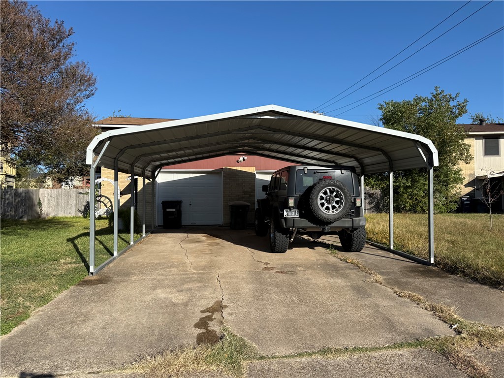 1409 Hawk Tree Drive College Station, TX 77845 - Photo 3 of 12 a view of a car parked in front of house