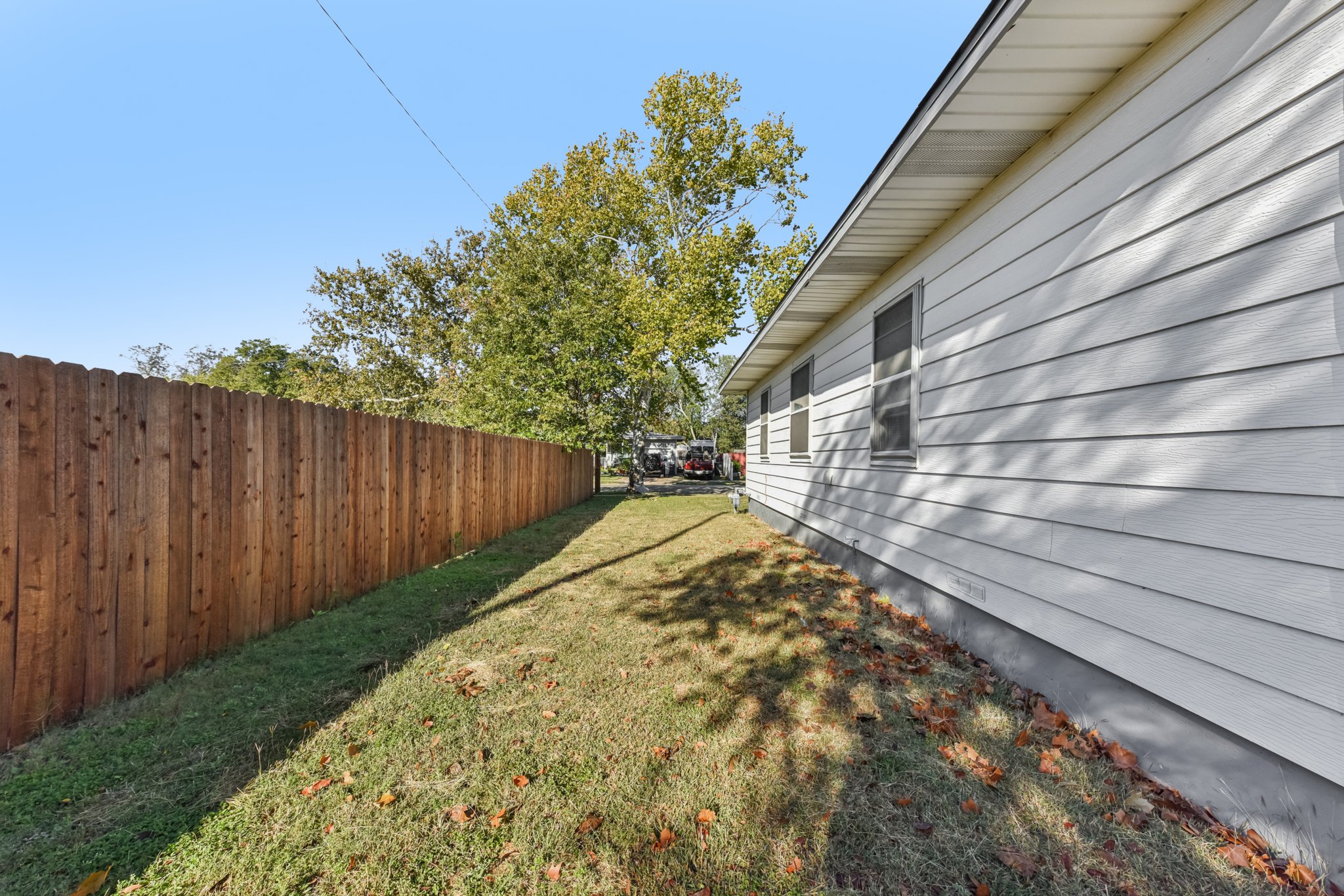 1102 Jackson Street Killeen, TX 76541 - Photo 14 of 16 a view of backyard with wooden fence