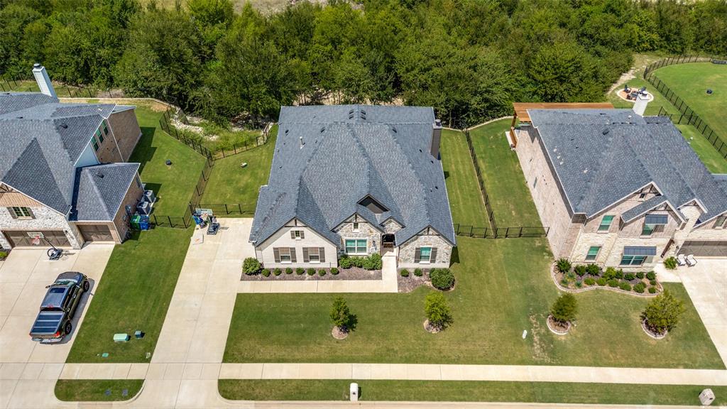 1113 Stone Bridge Pass Gunter, TX 75058 - Photo 27 of 32 an aerial view of a residential houses with outdoor space