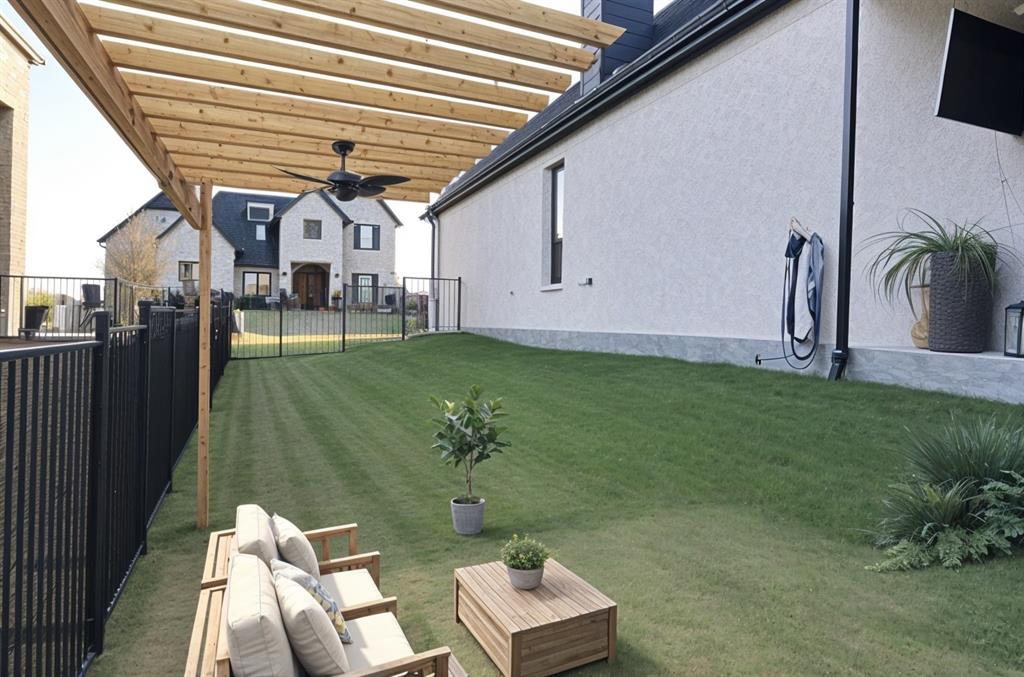 1113 Stone Bridge Pass Gunter, TX 75058 - Photo 29 of 32 a backyard of a house with table and chairs