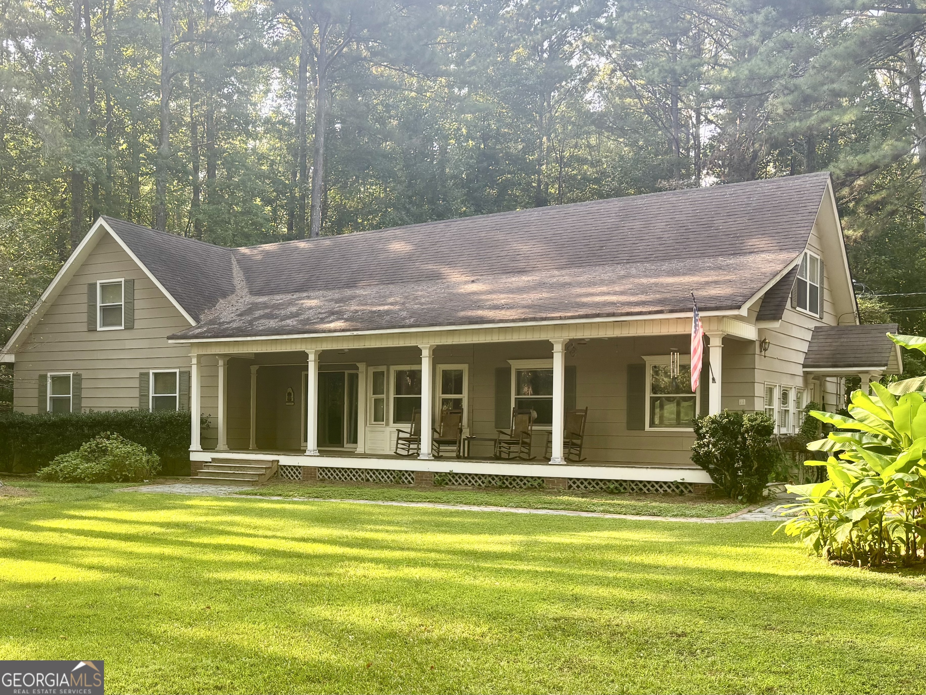 230 White Road Fayetteville, GA 30214 - Photo 1 of 38 a front view of a house with a garden