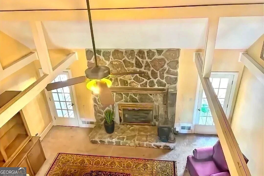 230 White Road Fayetteville, GA 30214 - Photo 14 of 38 a living room with a couch next to a window