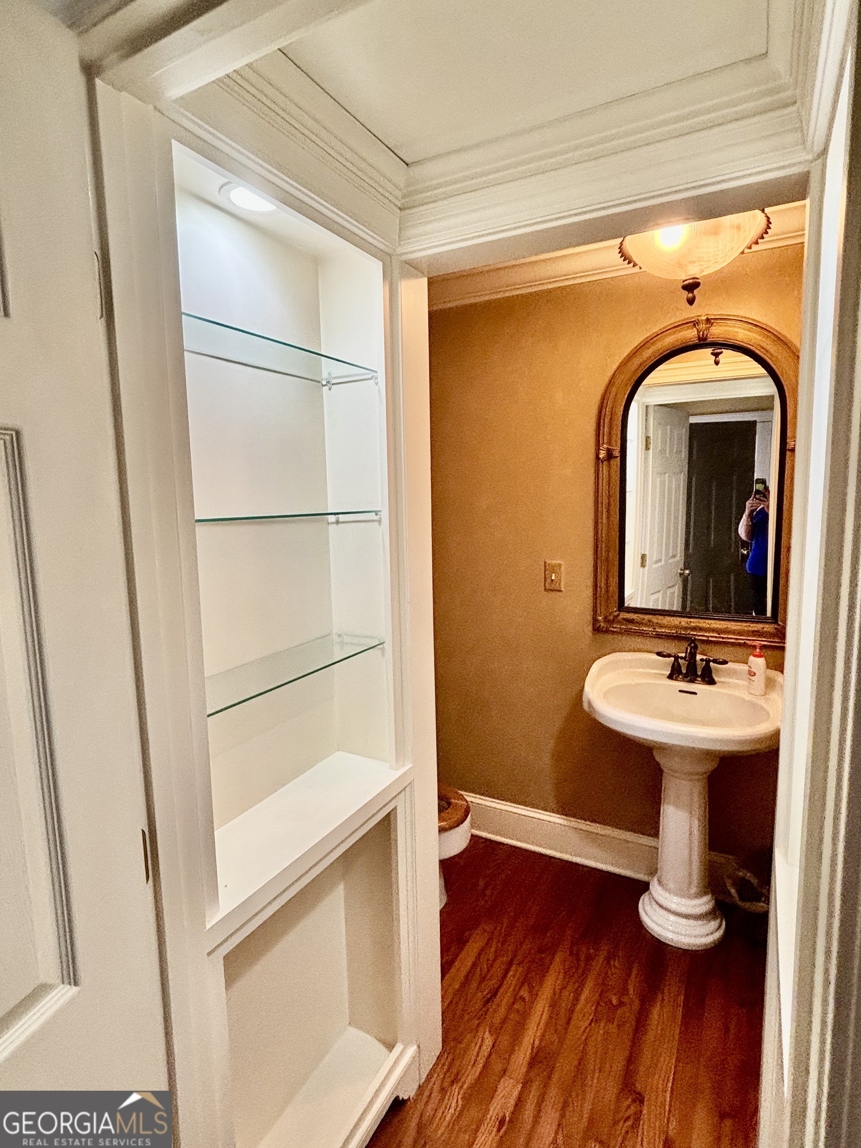 230 White Road Fayetteville, GA 30214 - Photo 23 of 38 a bathroom with a sink a toilet and mirror
