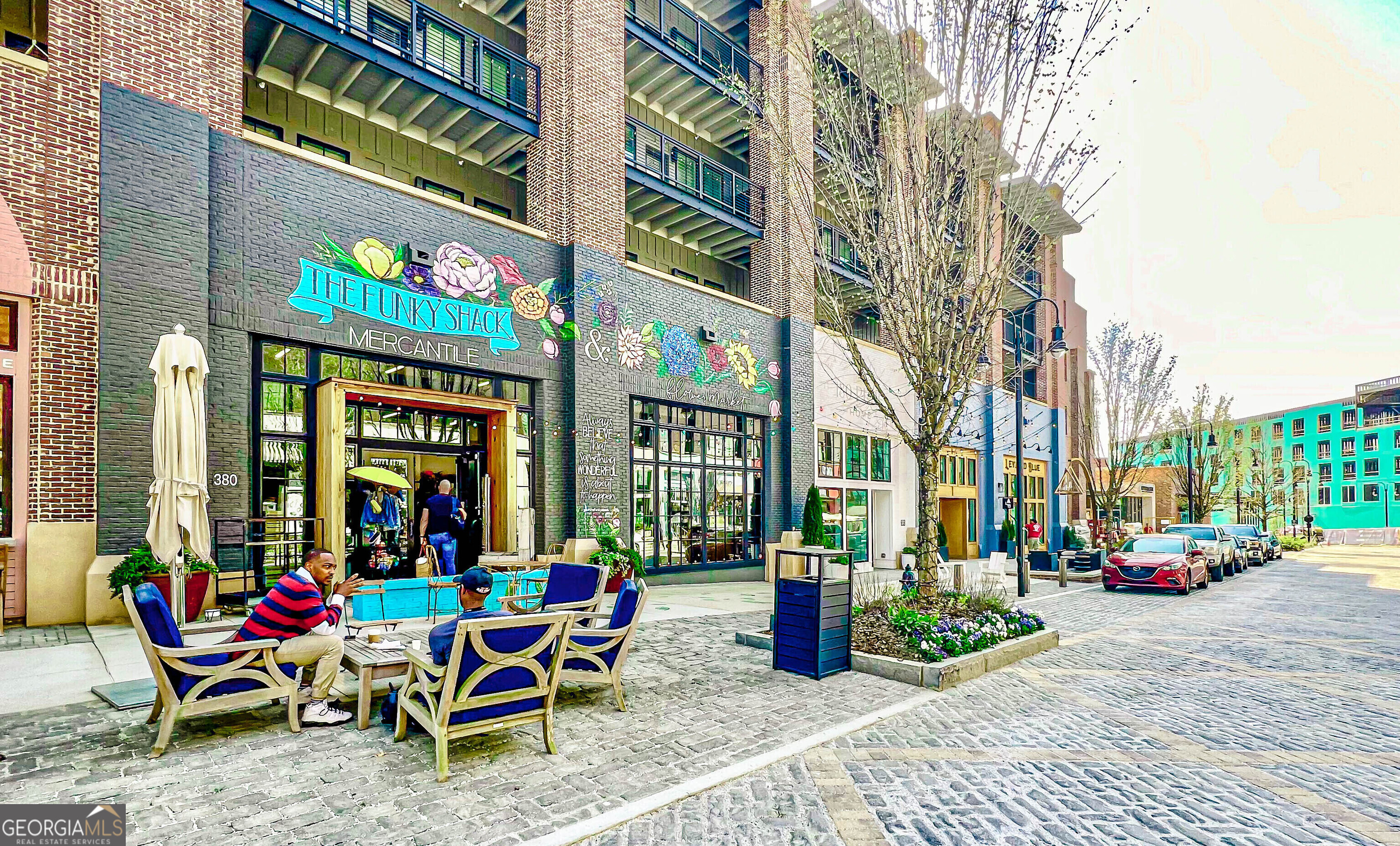 230 White Road Fayetteville, GA 30214 - Photo 37 of 38 a bench is sitting in front of a building