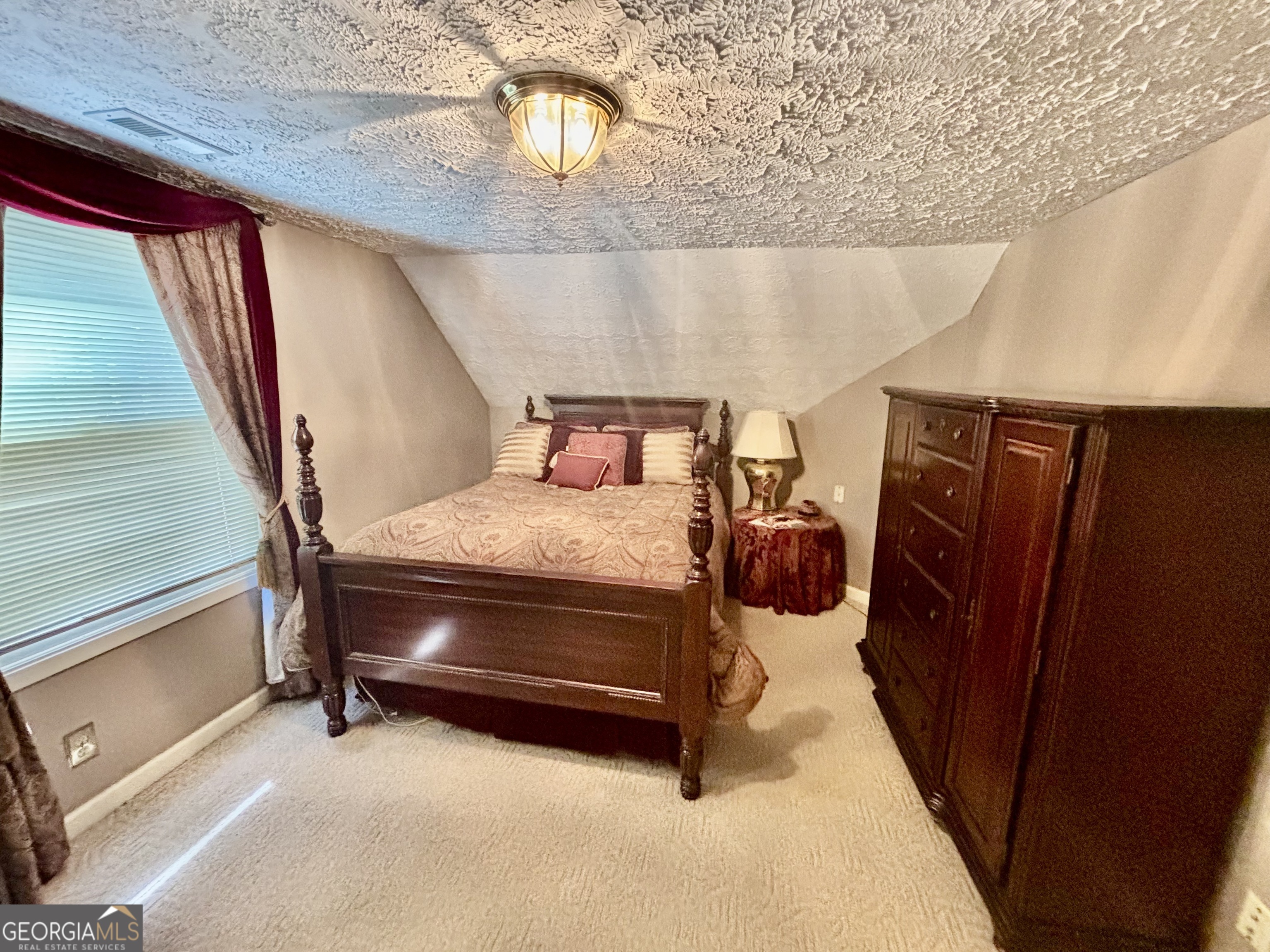 230 White Road Fayetteville, GA 30214 - Photo 10 of 38 a bedroom with furniture and a window