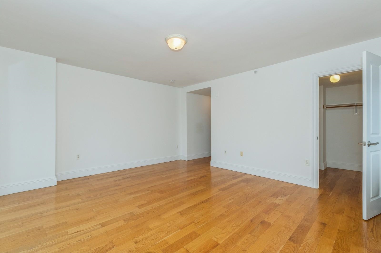 125 43rd Street, Unit 405 Union City, NJ 07087 - Photo 4 of 20 a view of an empty room