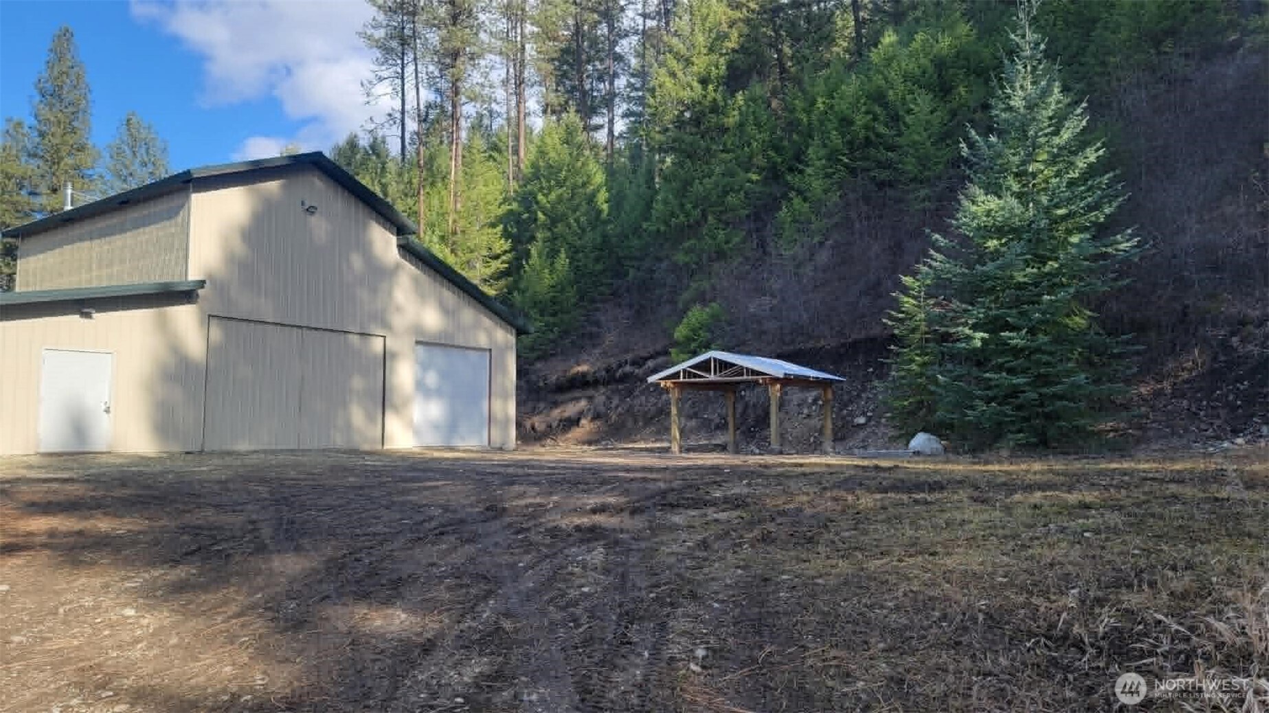 30543 State Rte 20 Republic, WA 99166 - Photo 20 of 20 a front view of a house with a yard