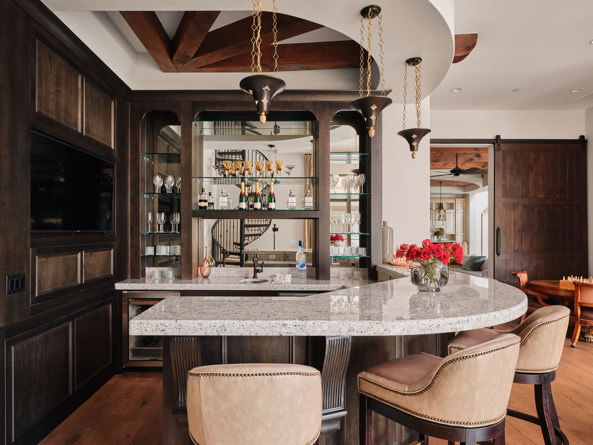 3667 Stoneridge Road Austin, TX 78746 - Photo 16 of 39 a kitchen with stainless steel appliances a dining table and chairs