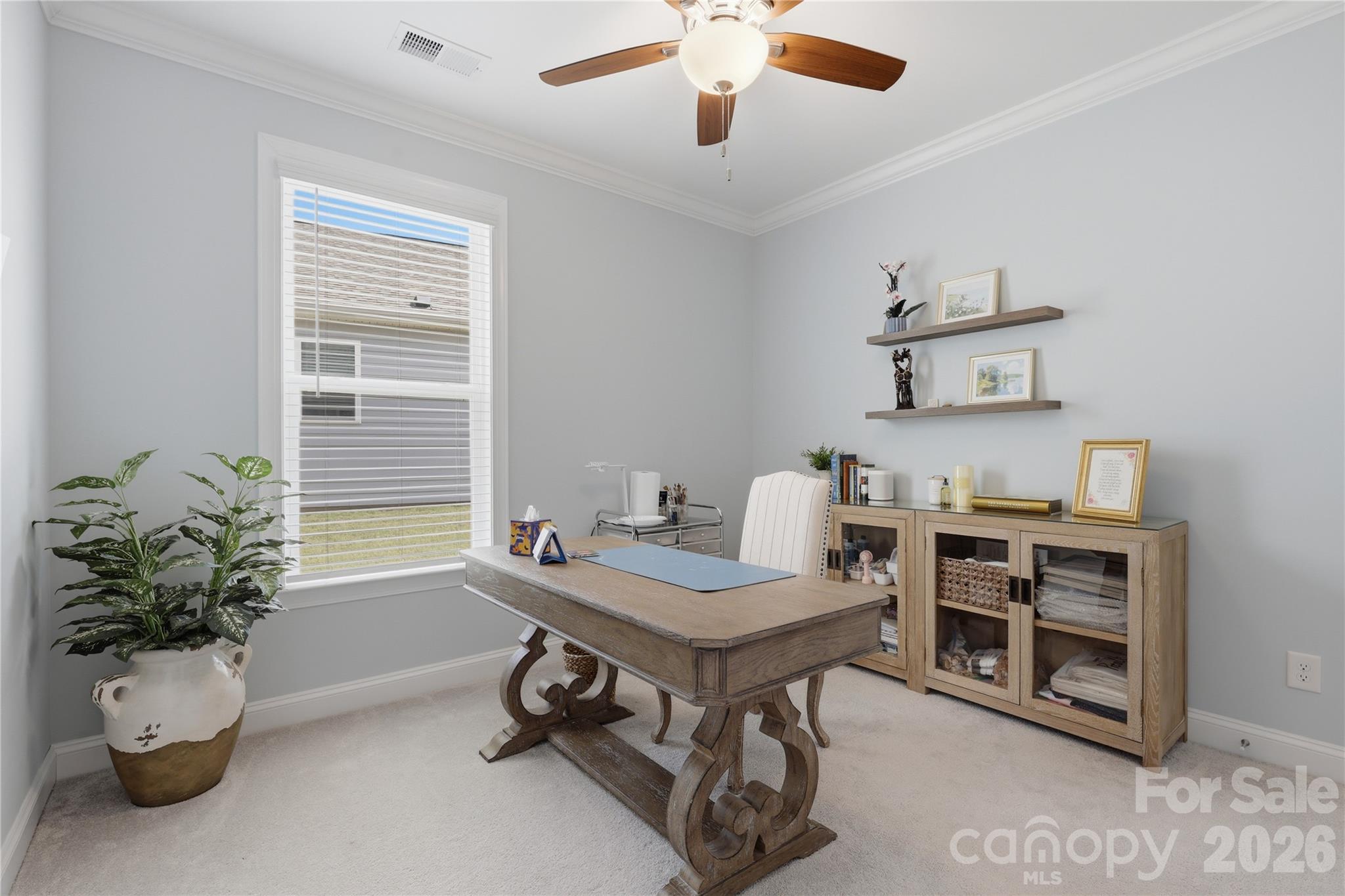 3023 Eagle Ridge Lane Indian Trail, NC 28079 - Photo 41 of 47 a view of a workspace with furniture and a potted plant