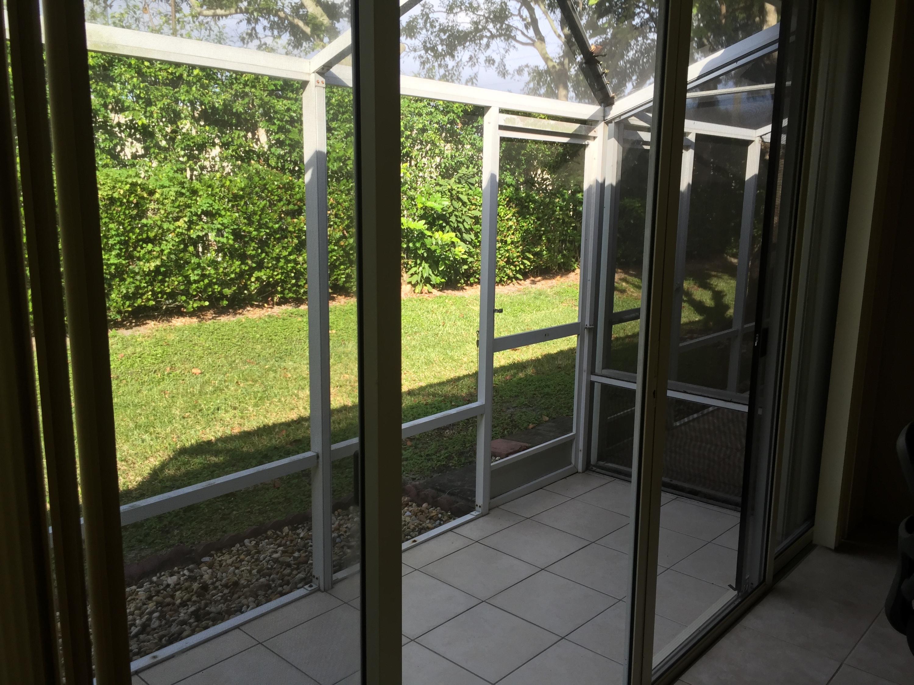 6057 Petunia Road Delray Beach, FL 33484 - Photo 3 of 18 Rear Patio