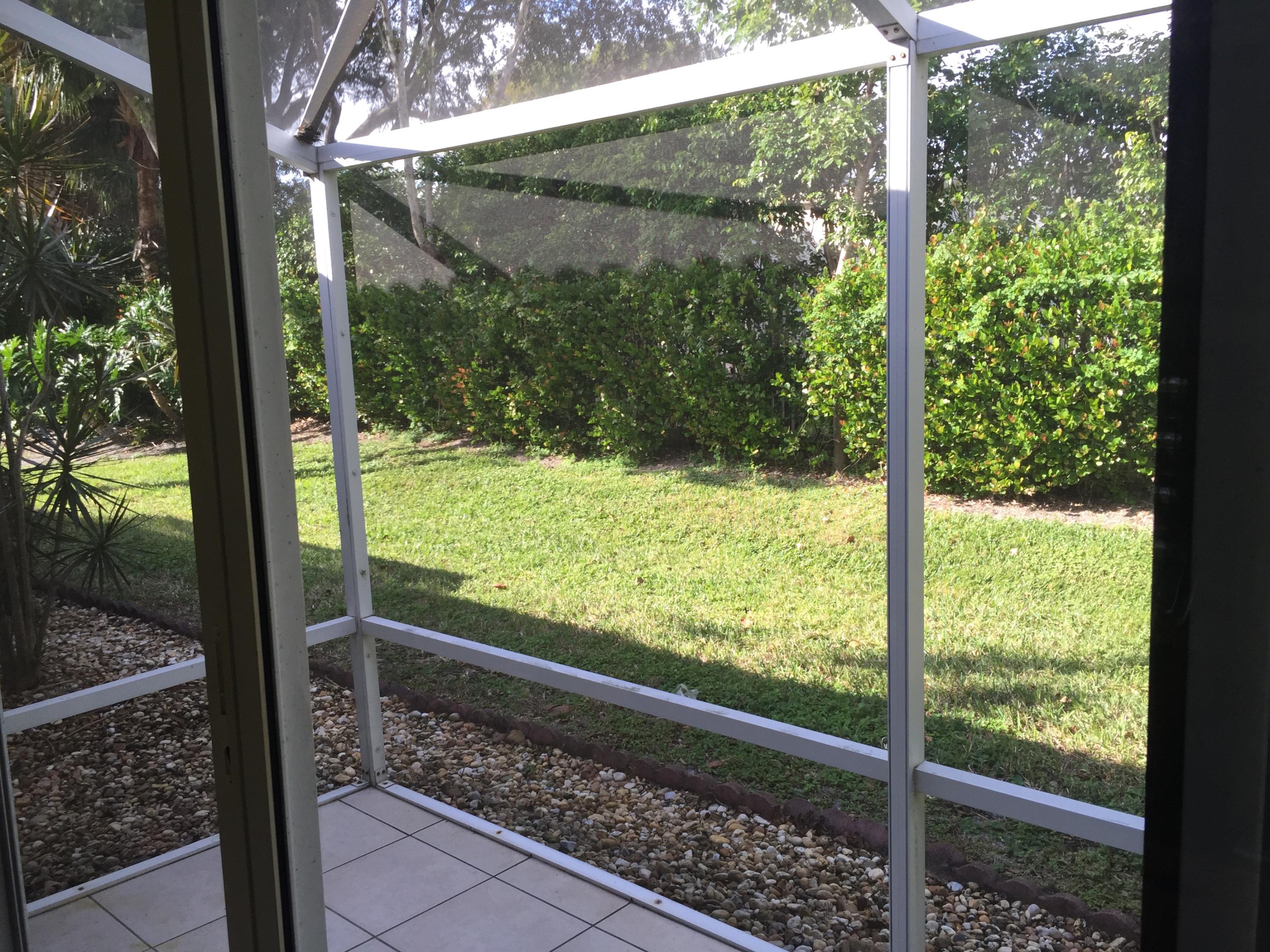 6057 Petunia Road Delray Beach, FL 33484 - Photo 4 of 18 Rear Patio