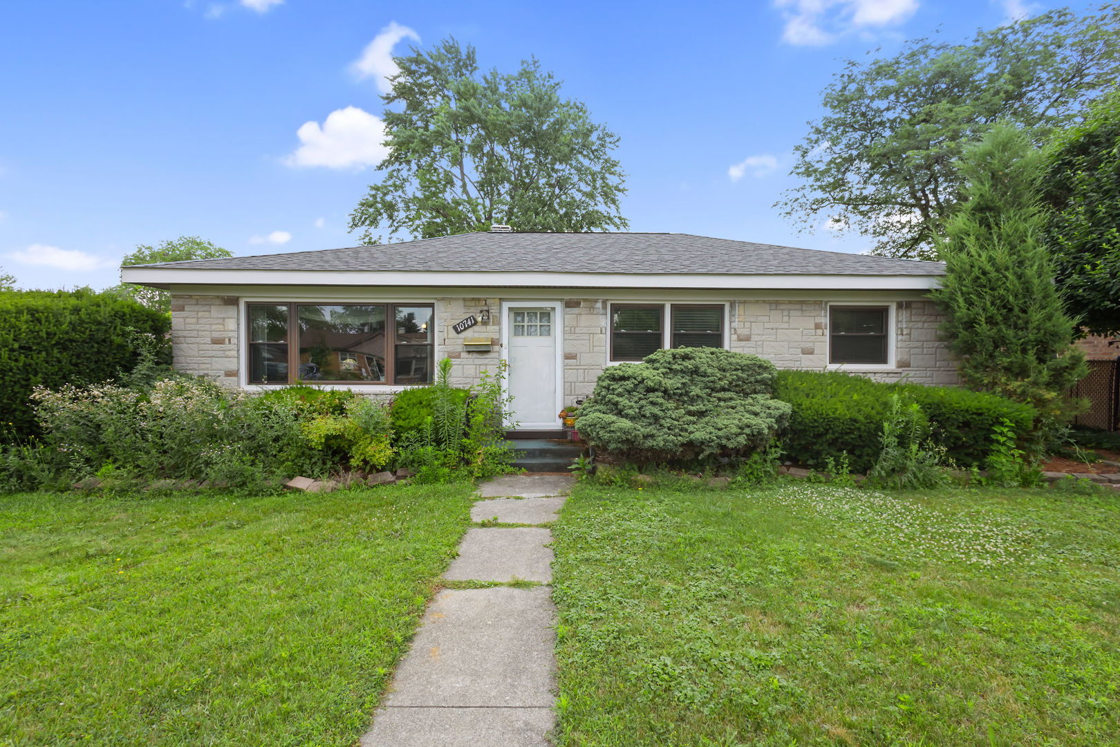 10741 Mason Avenue Chicago Ridge, IL 60415 - Photo 1 of 23 a front view of house with yard and green space