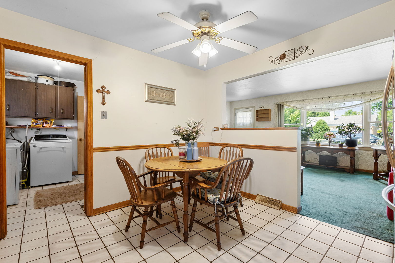 10741 Mason Avenue Chicago Ridge, IL 60415 - Photo 13 of 23 a view of a dining room with furniture and a chandelier fan