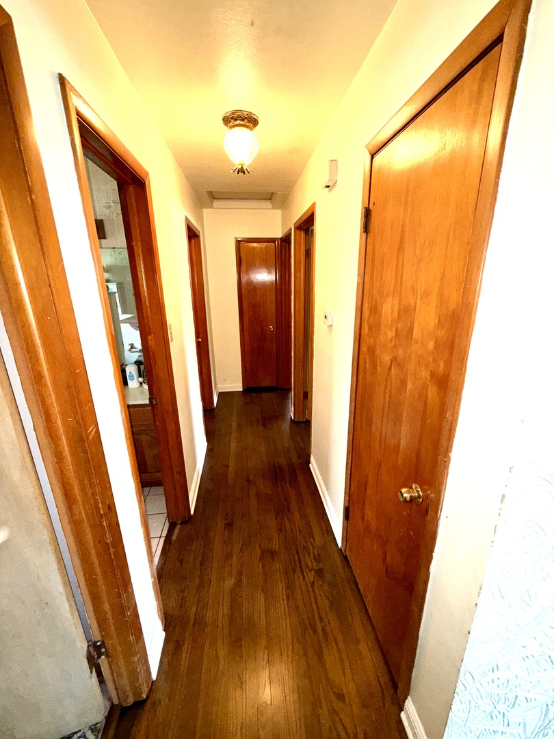 10741 Mason Avenue Chicago Ridge, IL 60415 - Photo 5 of 23 a view of wooden floor