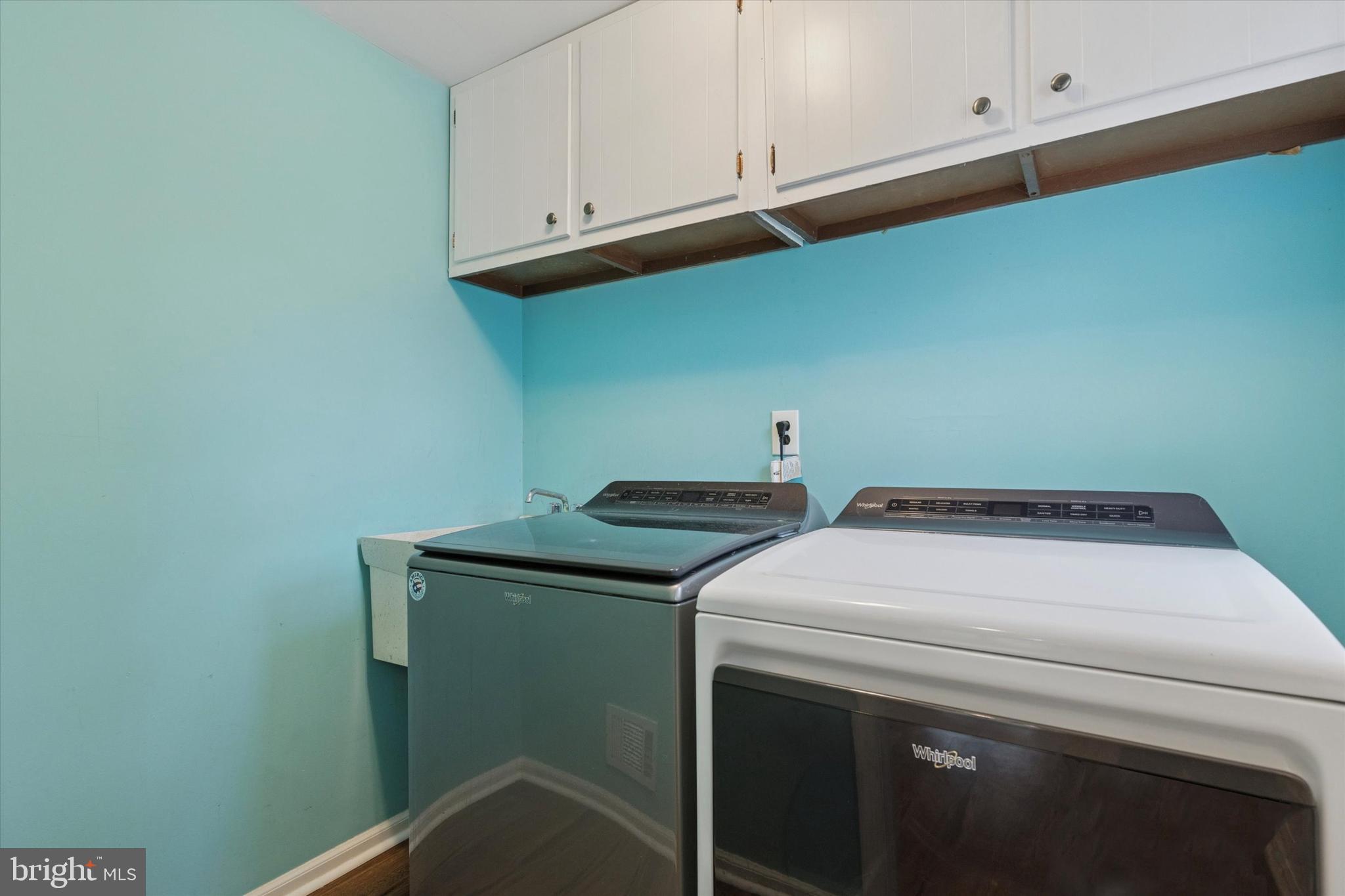 685 Hopewell Road Downingtown, PA 19335 - Photo 16 of 39 a utility room with dryer and washer