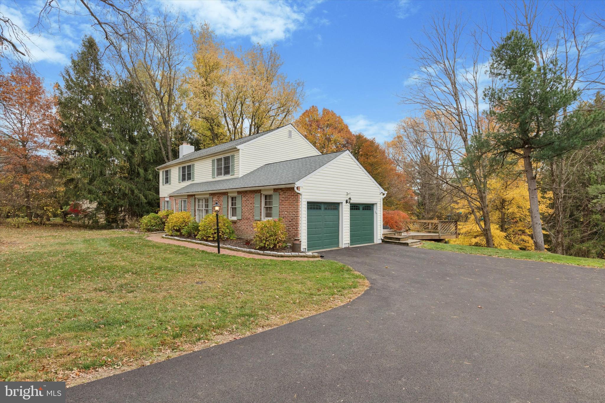 685 Hopewell Road Downingtown, PA 19335 - Photo 3 of 39 a front view of a house with a yard