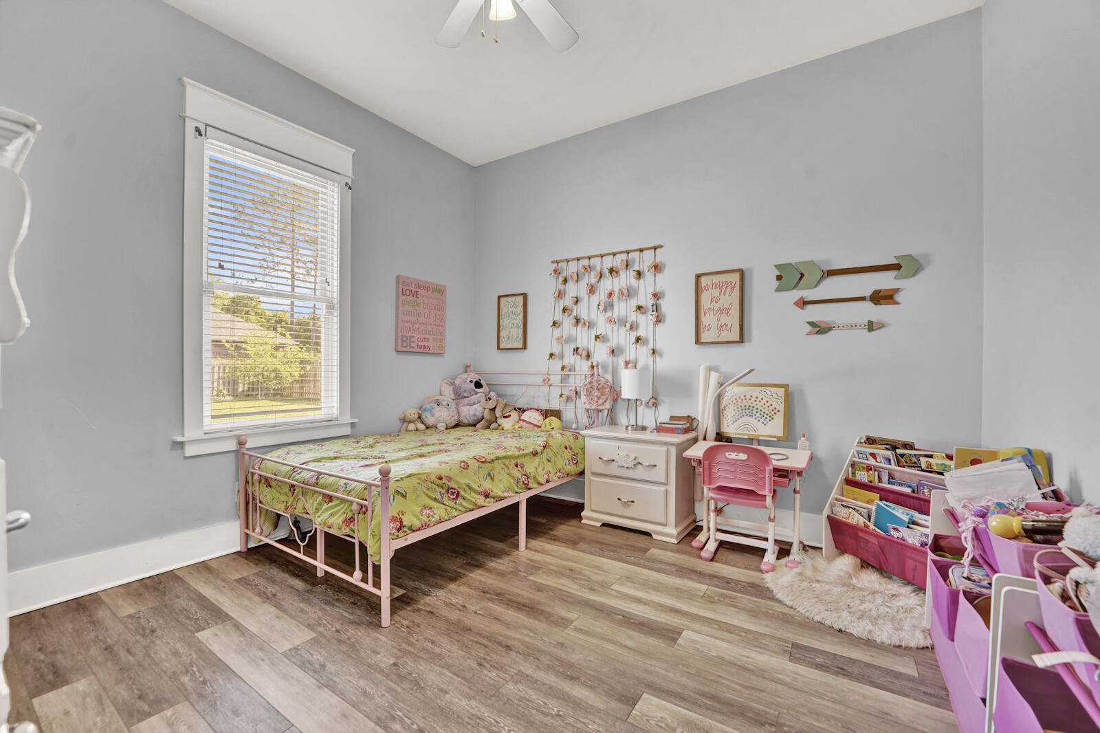 738 Symphony Way Freeport, FL 32439 - Photo 39 of 69 a bedroom with a bed and a window