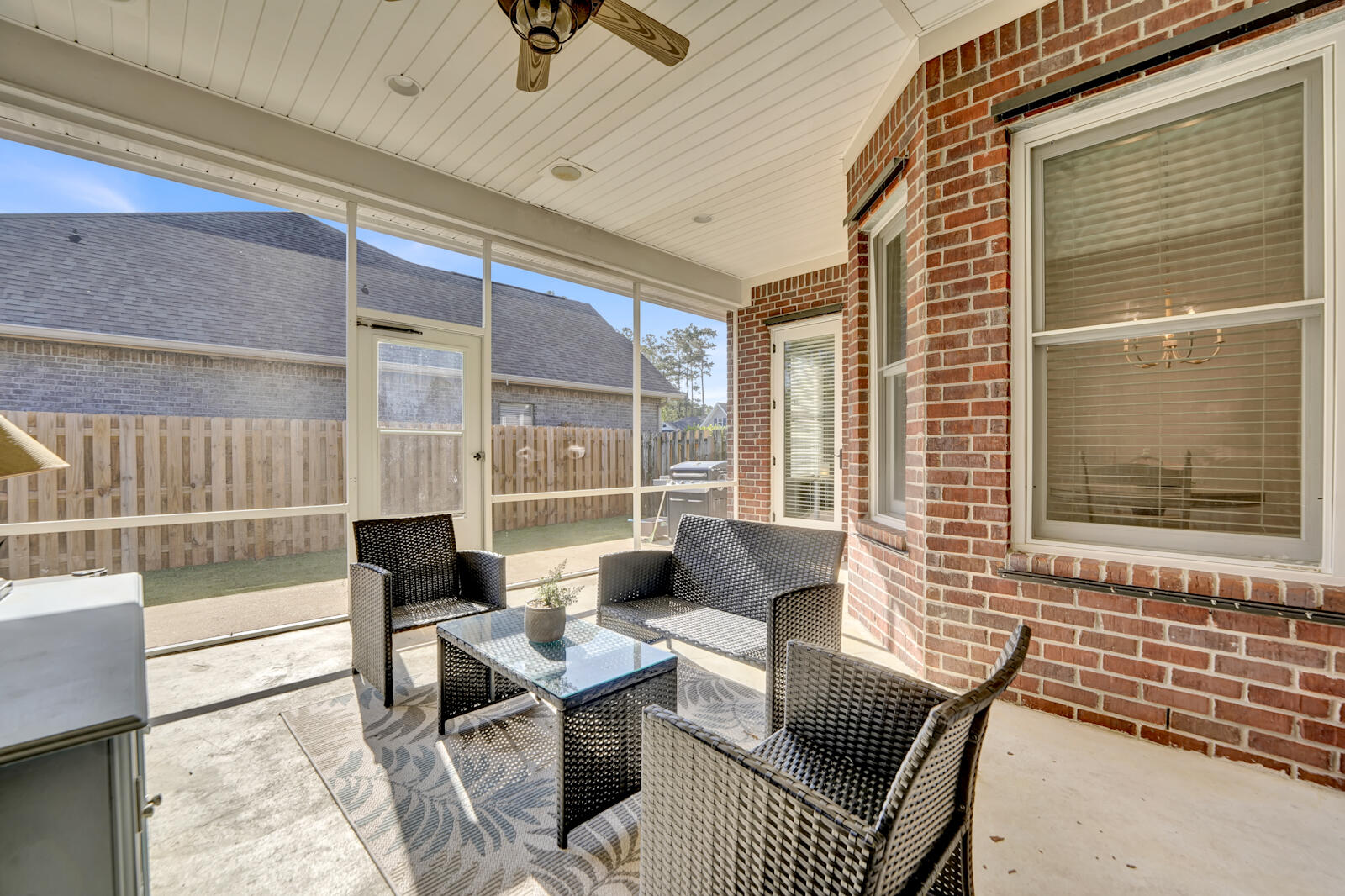 738 Symphony Way Freeport, FL 32439 - Photo 42 of 69 a living room with furniture and a window