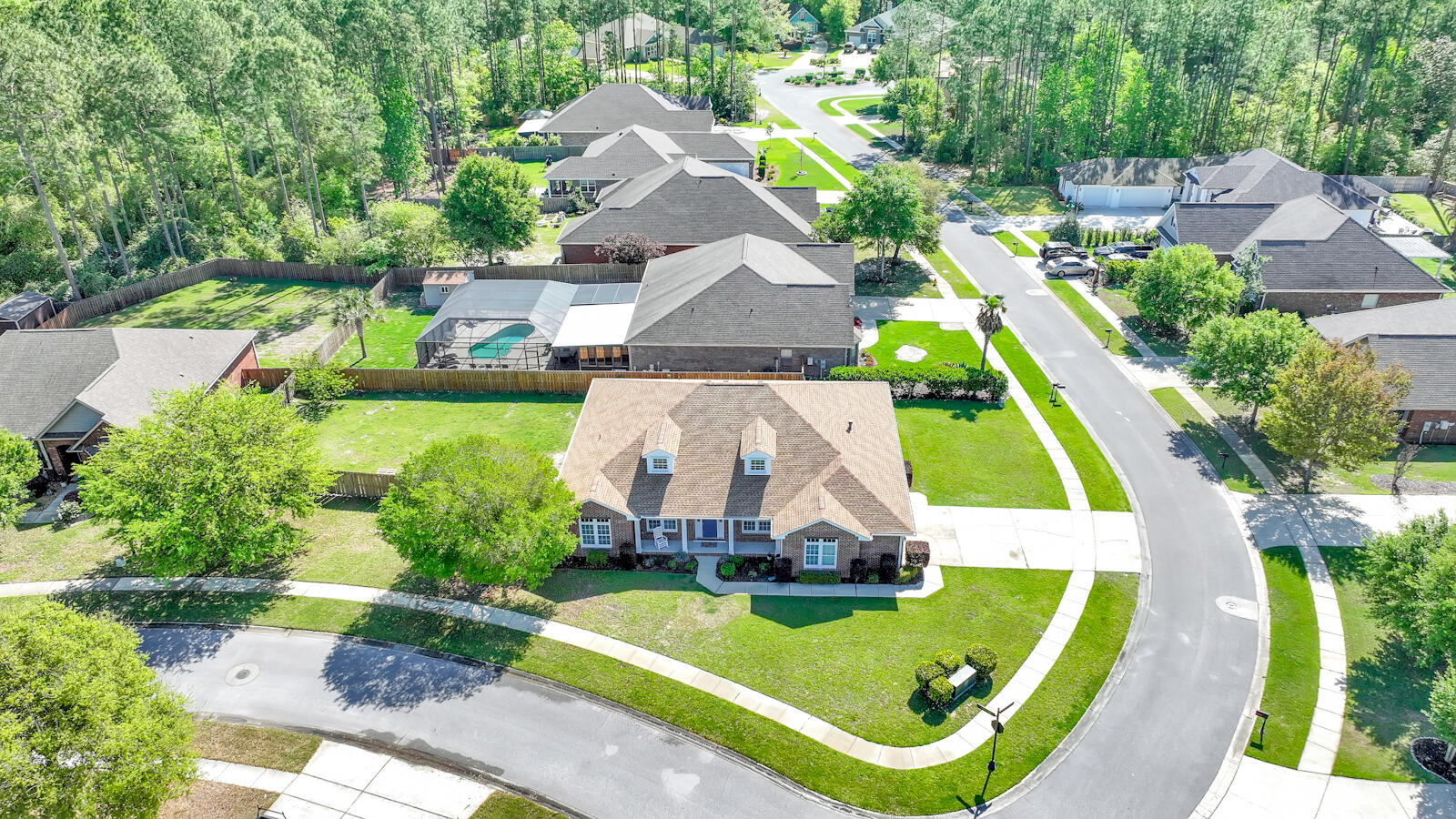 738 Symphony Way Freeport, FL 32439 - Photo 47 of 69 an aerial view of a house with swimming pool patio and outdoor seating