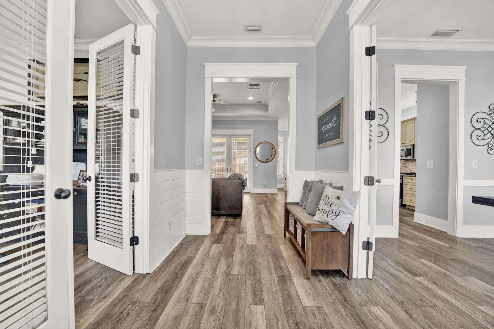 738 Symphony Way Freeport, FL 32439 - Photo 5 of 69 a view of a bedroom with wooden floor