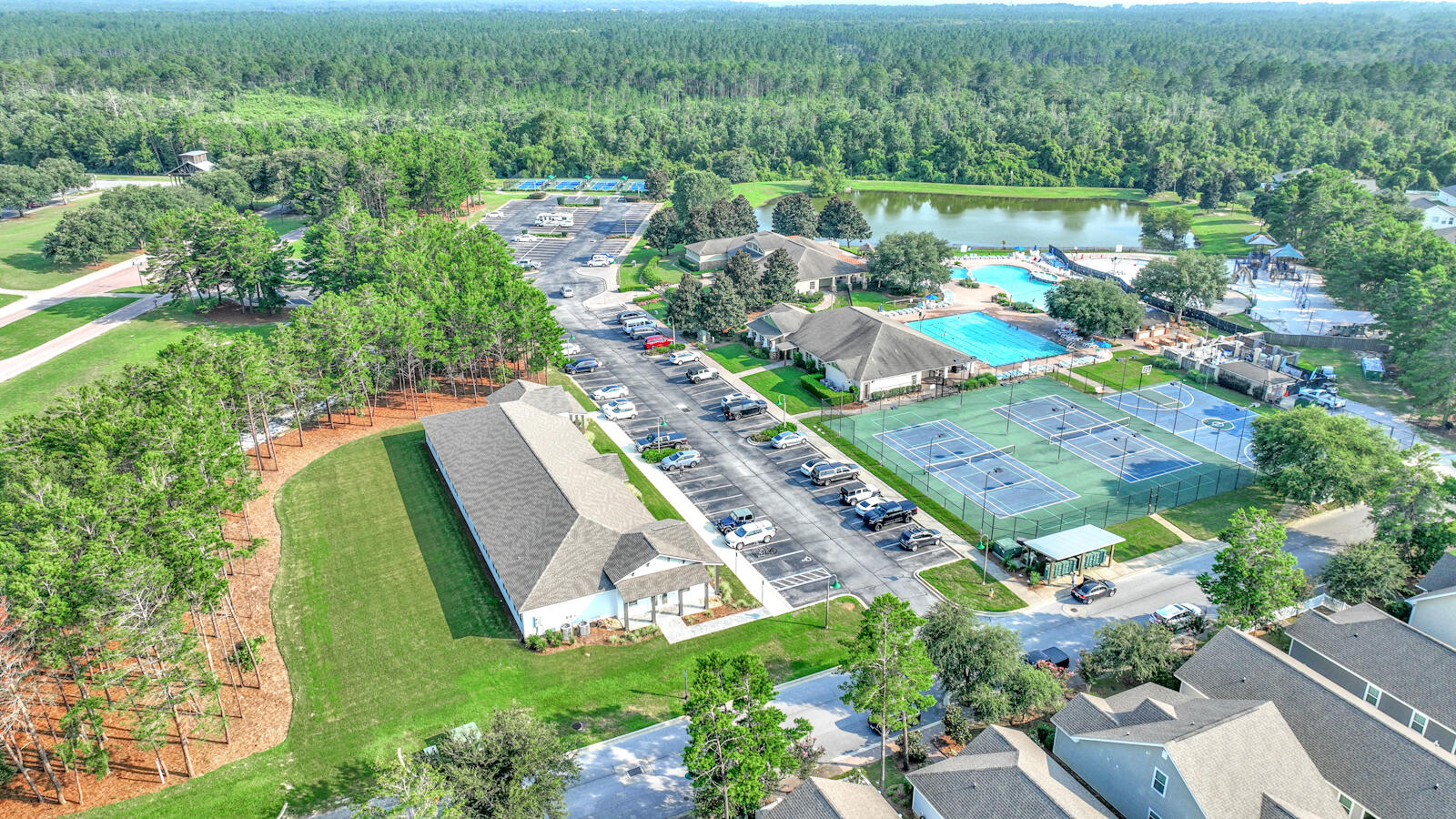 738 Symphony Way Freeport, FL 32439 - Photo 61 of 69 an aerial view of a house with a yard and lake view