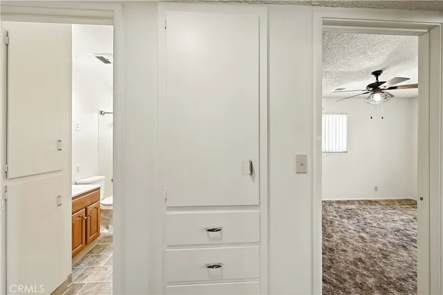 a view of a livingroom with wooden floor and a window