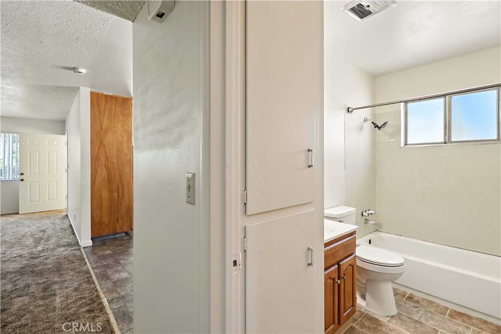 6345 Merced Falls Road Snelling, CA 95369 - Photo 22 of 54 a bathroom with a toilet a sink and shower