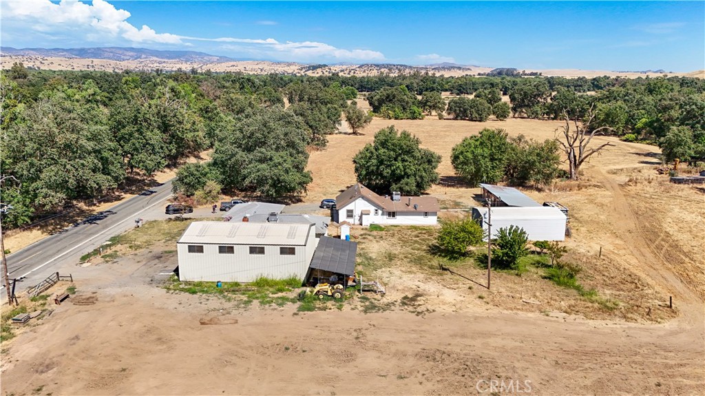 6345 Merced Falls Road Snelling, CA 95369 - Photo 50 of 54 an aerial view of a house with a yard and lake view
