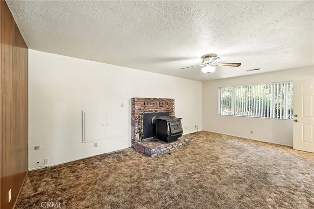 a view of a livingroom with a fireplace