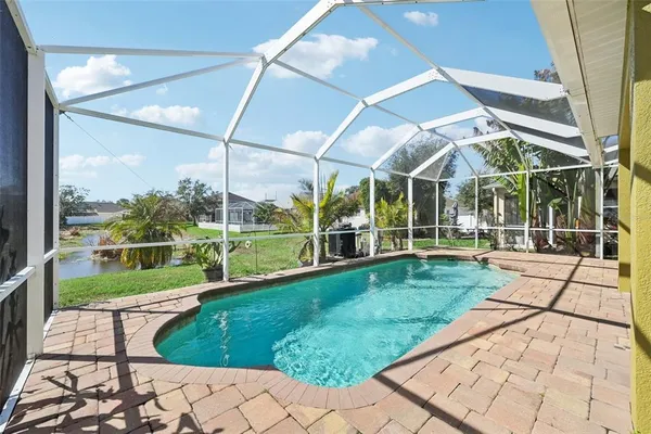 a view of a backyard with porch