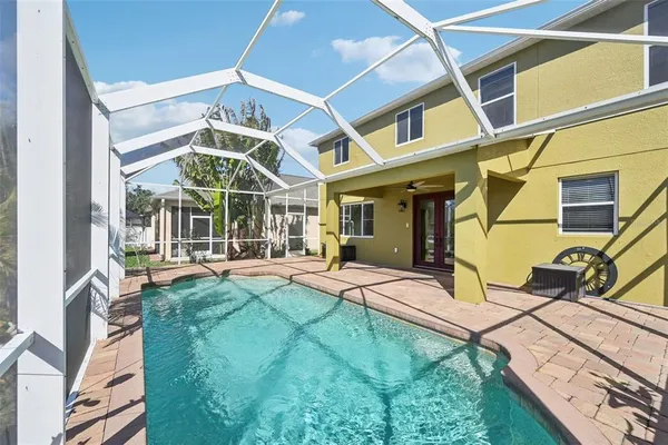 a view of an house with backyard porch and patio